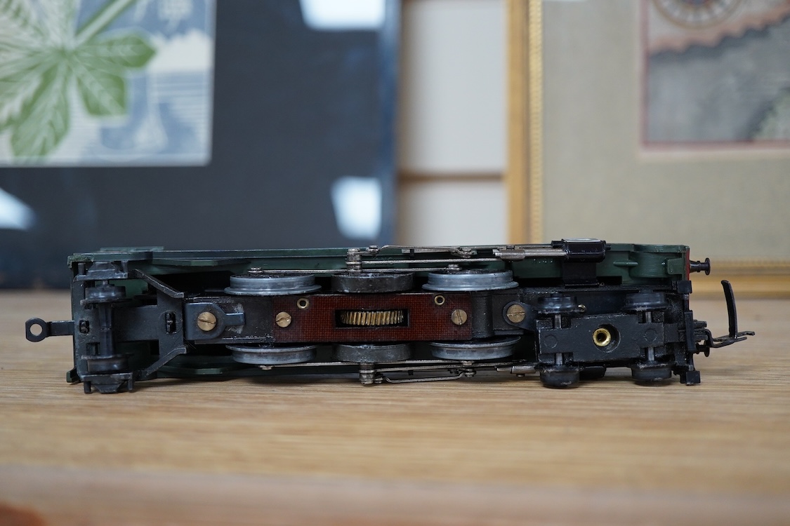 A quantity of 00 gauge model railway by Hornby, Tri-ang, etc. including nineteen locomotives in BR, GWR, LMS, etc. liveries, together with a boxed electrically operated turntable (R070), a terraced house (R8621) and a ga